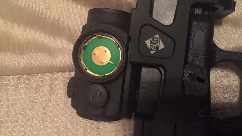 Older Aimpoint T-1 battery contact with three raised contact points