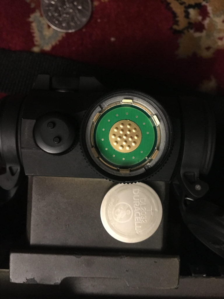 Later Aimpoint T-1 battery contact with multiple raised contact points