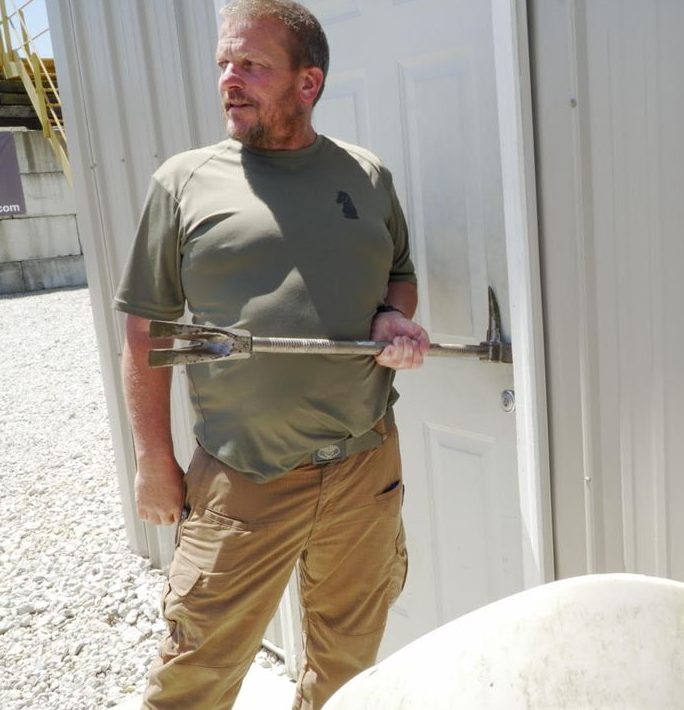 Joe Weyer demonstrating mechanical door breaching at Alliance Police Training